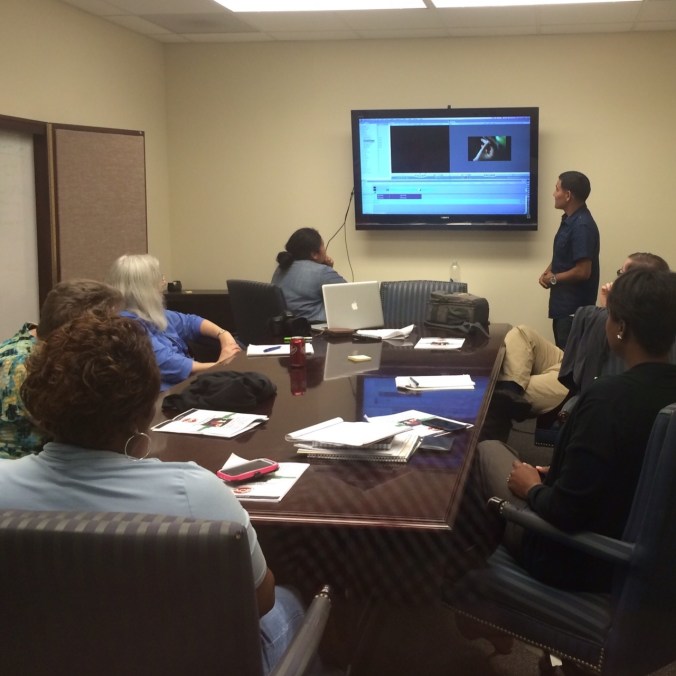 Adrian and Jean's small group look at their work on a timeline and make cuts.