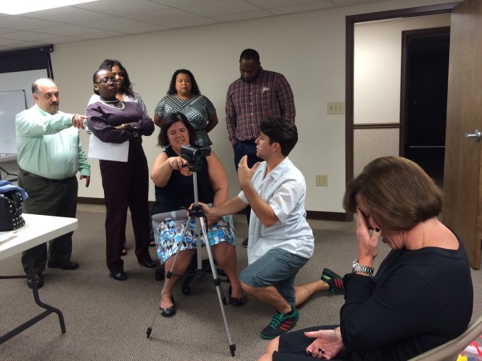 Attorneys start camera work on a mock case, with Fernando walking them through the interview process. (Attorneys make the best actors!)