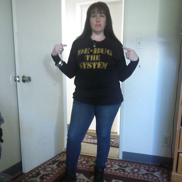 His mom Cherisse proudly wears her "De-Bug The System" shirt. Her love for her son is a testimony to the power of faith in action. She herself has been through a tough few years, and being able to get through these last 6 months and being the instrumental force in her son's case has been part of her life's journey.