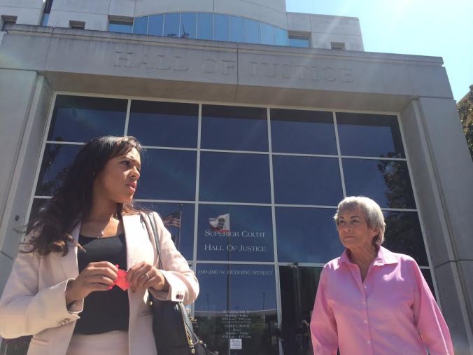 Santa Clara County Public Defender Jessica Smith, leaving court with Rusty's mom after freeing him from a life sentence. Together, they walked straight to the jail to see when he was getting out later that day.